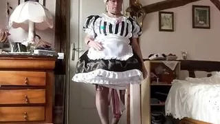 In a white and black maid outfit for a day