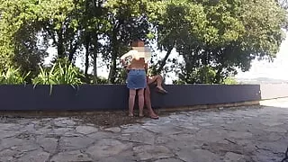 Caught Naked exhibitionist wife masturbates stranger's cock in front of everyone walking on public street in Spain