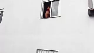 Crazy Girl Fucked with a Dildo Sticking Her Big Ass Out the Window and Pissed on a Stranger!