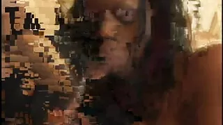 Two ebony honeys share one hard cock in front of the fireplace