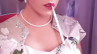 Elegance, a long cigarette, and some dangled snap inhales....