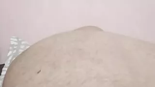 Lying naked doing nothing