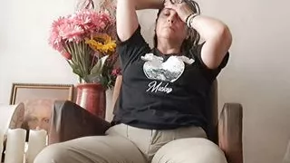 wife taking off her clothes suggesting sex