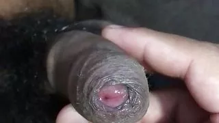 a small penis of a young man who likes to cum