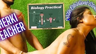 Teacher with obedient student in Biology Practical class