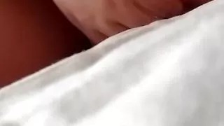 I'm caressing my chest on the bed