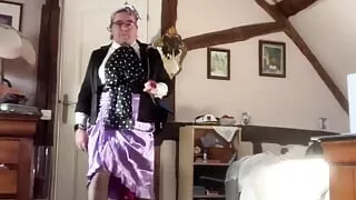 Outfitted with a lila skirt with a slit on the side for an evening