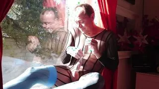 Crossdresser cumshot in a window