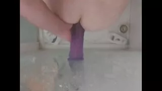 amateur shower taking a big dildo in the ass