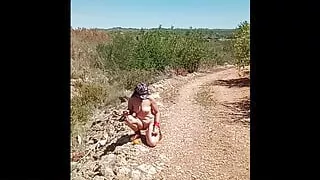 Walking naked in field