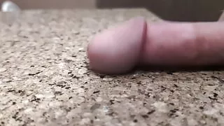 Slapping dick on the counter in slow motion