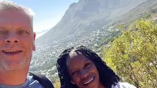 Sezy black Milf invites white neighbor for a massage