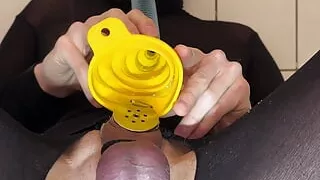 Drinking own piss while being caged in micro chastity cage