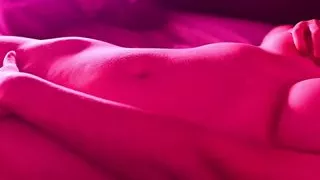 The teenager masturbates on his bed to Neon