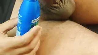Old daddy masturbating with condom when wife not at home.