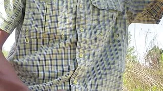 Log trucker handles his wood in the woods.