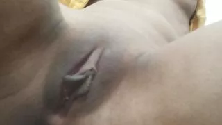 Girl strips and fingers pussy in video