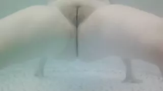 Raven Hair MILF under water playing with pussy and big tits