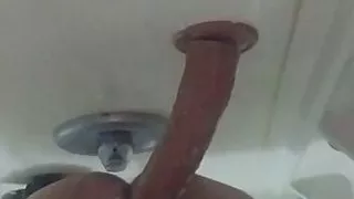 Jarmus with a deep dildo in the shower quickie