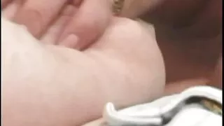 Big tits red head chick gets tits licked and twat fucked by hot cock duo on sofa