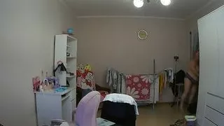 mother-in-law cleans the room naked