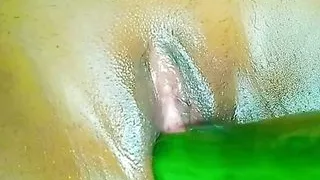 Big oiled tight pussy pleasure and enjoyment with cucumber
