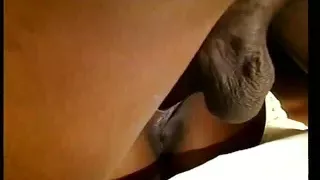 Busty ebony rides a white cock while giving blowy to the black man