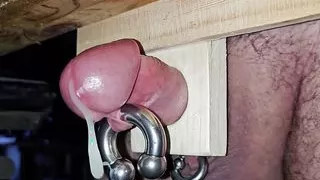 Cock stuck in a piece of wood and cummed