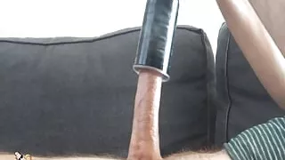 Enjoying an Automatic Male Masturbator until cumshot