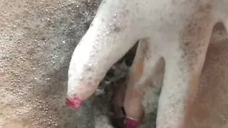 Andrea Kelly a slut with a hairy pussy stimulates her clit