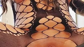 Milf loves masturbating in a special fishnetoutfit