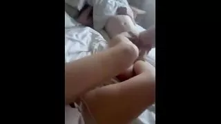 Footjob While He Relax on a Bed