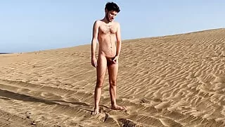 Public pissing on the gay nude beach