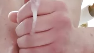 Men satisfy the shaft of the penis until it produces white fluid