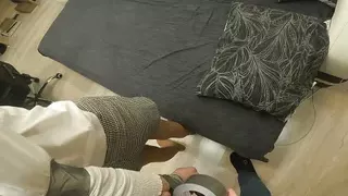 Silver tape bondage in tights and skirt