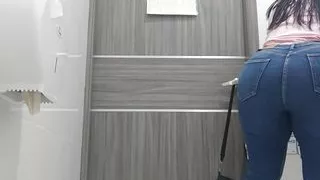 Amateur camera of girl pissing in public toilet