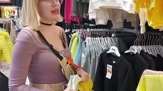 Gf gives a blowjob in the changing booth