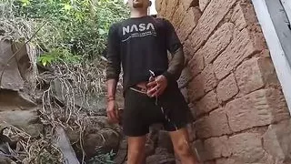 NASA scientist pissing on outside of British old house