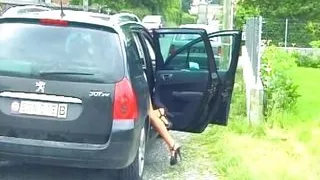 German chick with an amazing body rubbing her pussy outdoors