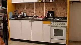 A brunette girl gets aroused when she receives a hot phone