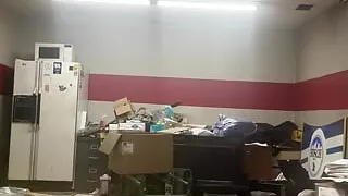 Voyeur view of big dick crossdressing bear cumming at work.