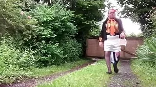 Dressed with a white skirt and orange striped blouse for a night out