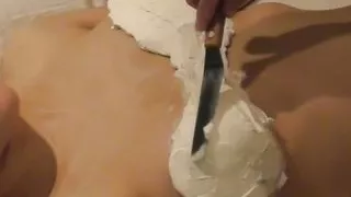 Home made personal shooting: Decorate the boobs of a busty beauty with fresh cream and lick off the cream.