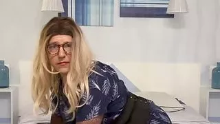 On my bed in a blue dress for a cumshot