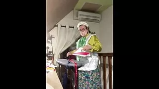 In boniche outfit, put on agag, a satin mask and iron the ribbons