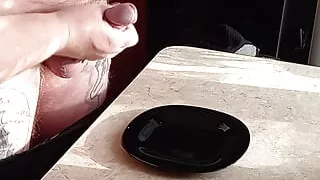 Mother-in-law jerks off my dick in the kitchen getting cum for breakfast