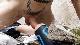 Outdoor fucking fleshlight on rocks
