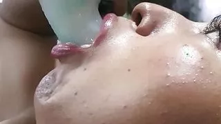 Beautiful blonde makes a deep throat with her dildo