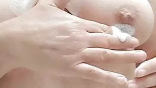 brushing my teeth and my tits dripping with thick liquid