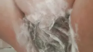 stepmom soaps her pussy and drips water on her vagina